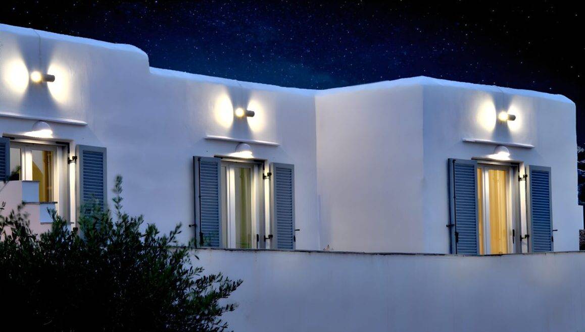 Stunning view of iconic whitewashed buildings in Mykonos under a clear blue sky.